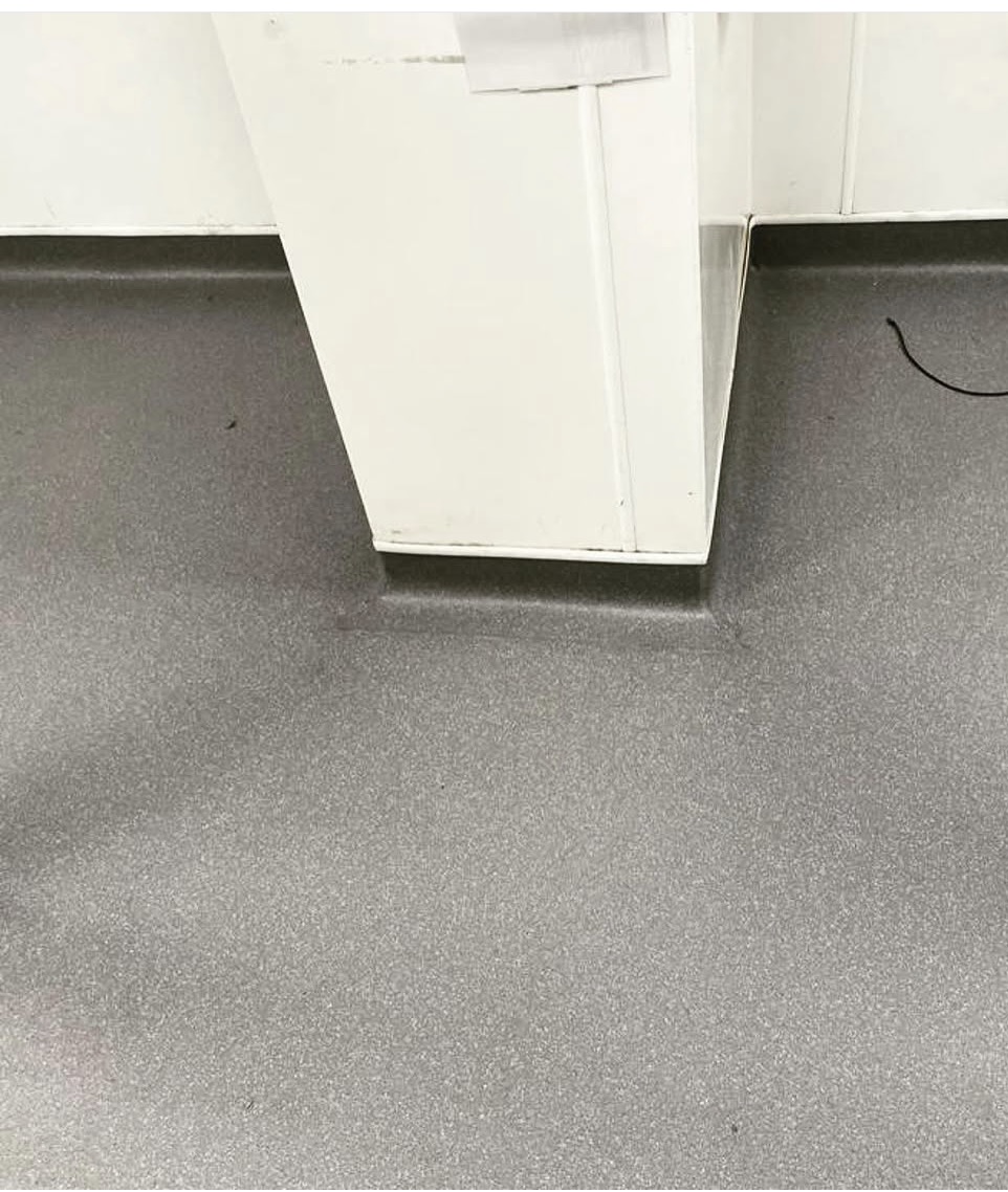 Dolphin safety flooring with coved detailing around a boxed column