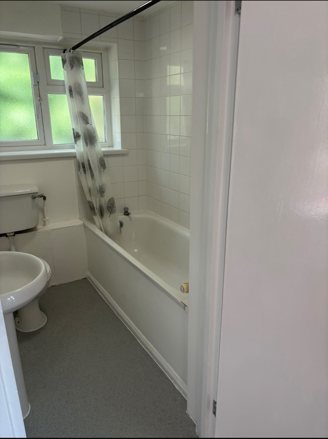 Completed Silver Birch safety flooring viewed from the bathroom doorway