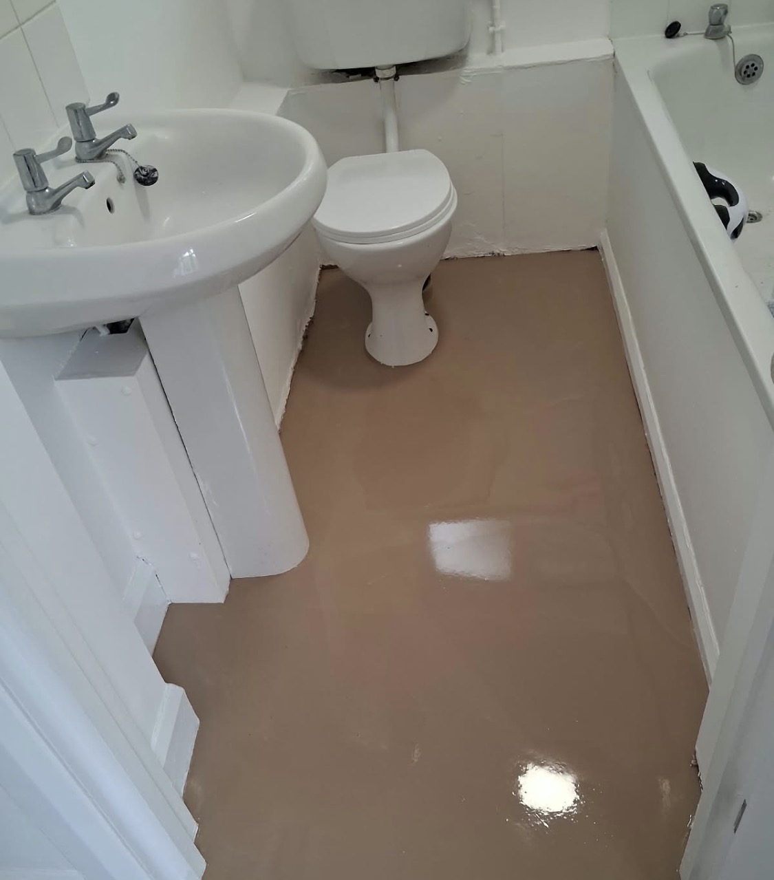 F. Ball Fast Track 30 levelling compound applied to the bathroom floor