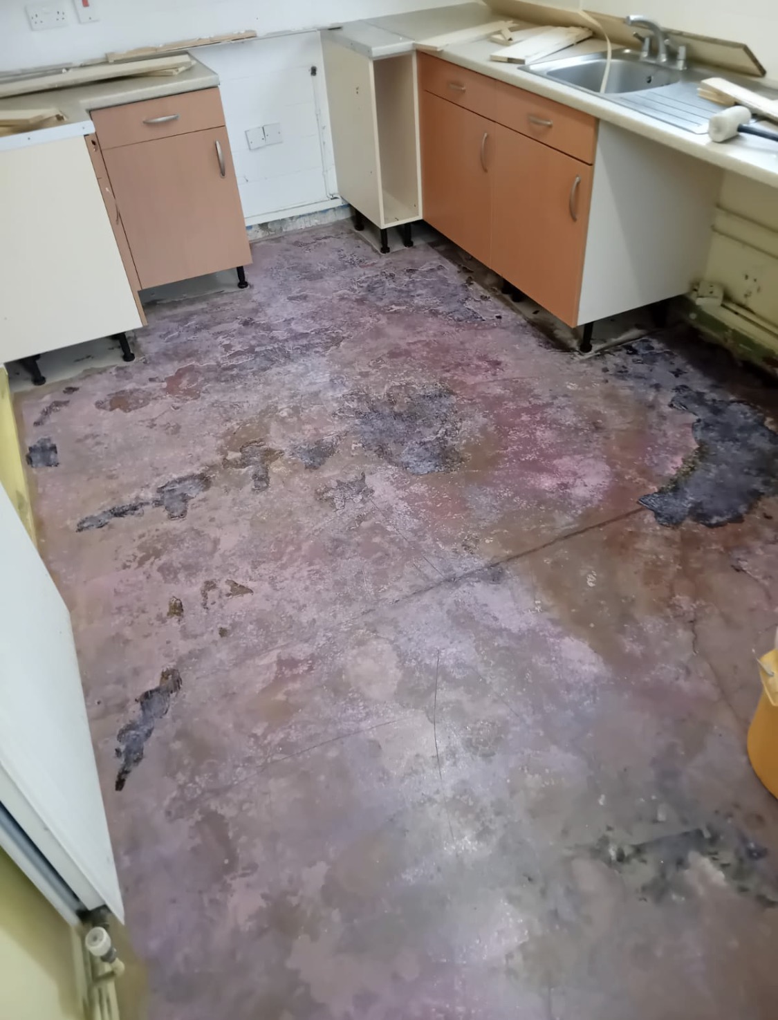 Kitchen subfloor after priming, before levelling