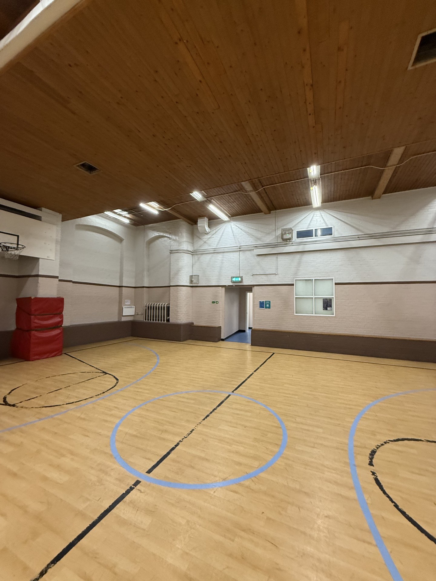 Before — the original sports hall floor